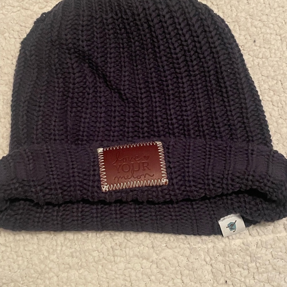 Love Your Melon Navy Knit Beanie with Brown Patch and Caribou Coffee patch